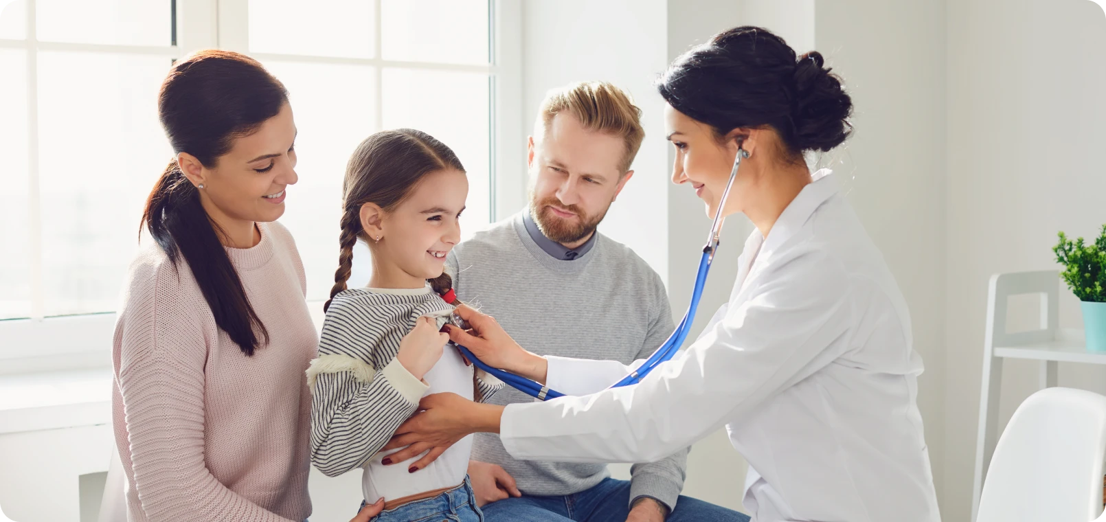 Family at pediatrician's office visit